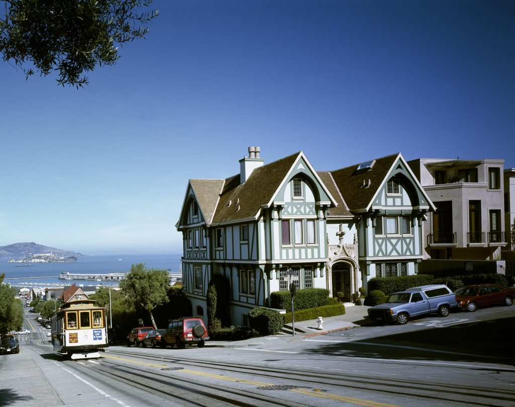 Cable car climbing Hyde Street toward San Francisco Bay