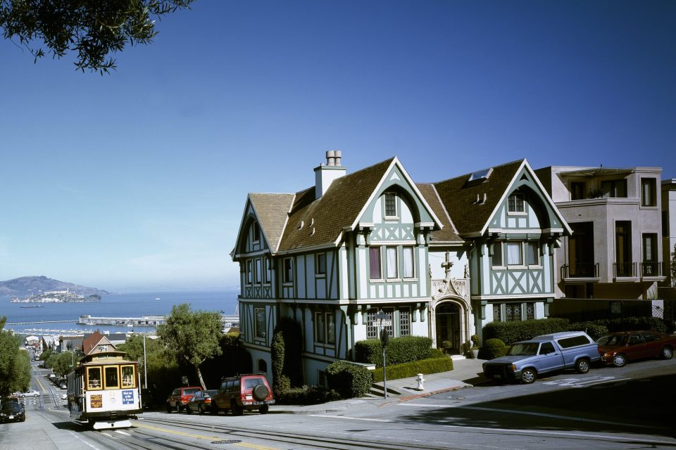 Cable car climbing Hyde Street toward San Francisco Bay